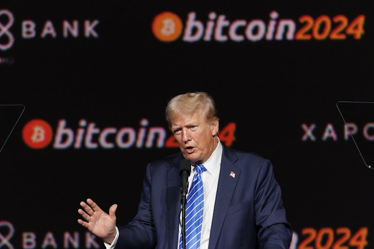 Donald Trump gestures while speaking at the annual Bitcoin conference